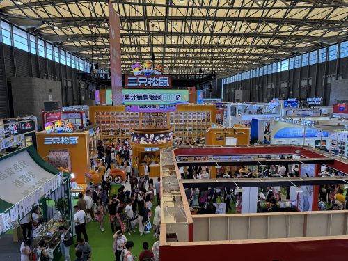 a tradeshow venue tightly packed with international companies